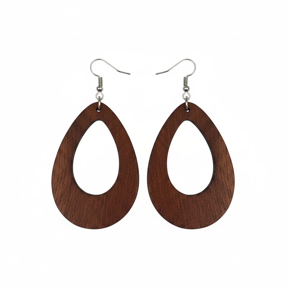 Wooden eggshaped earrings on a white background