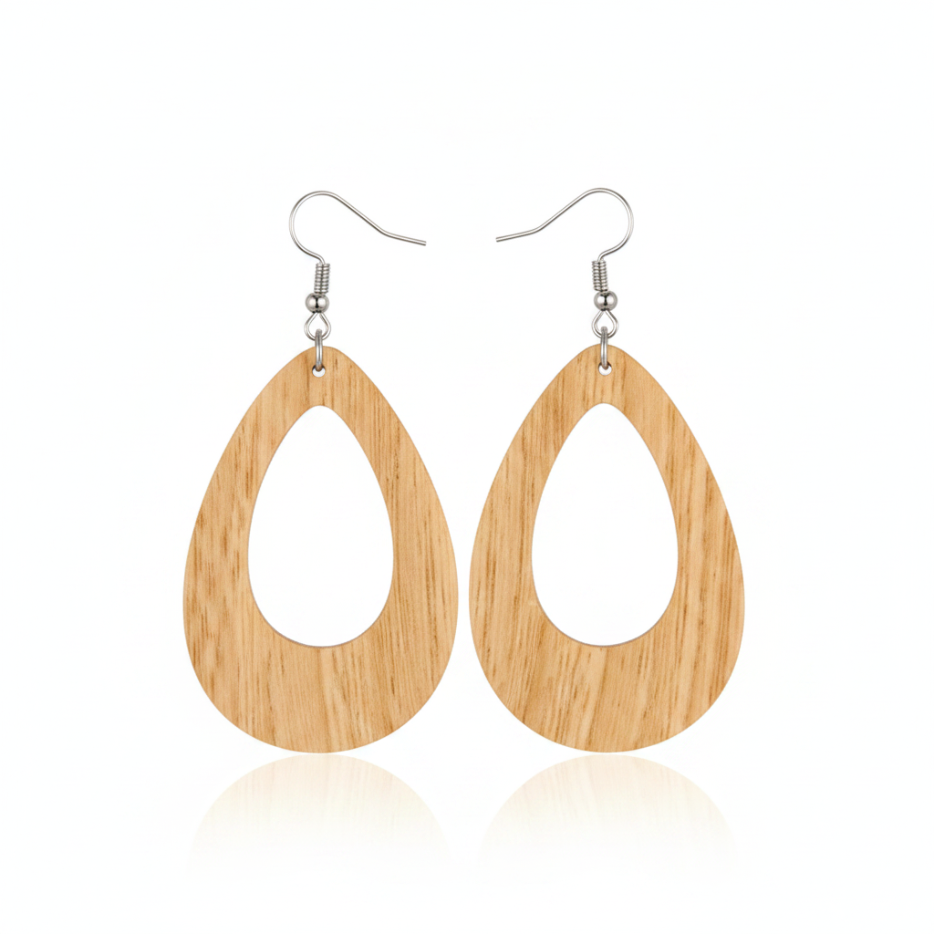 Wooden egg shaped earrings on a white background