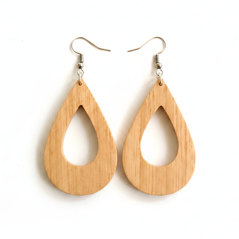 Wooden teardrop earrings on a white background