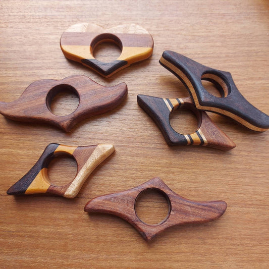 Collage of handmade wooden book page holders — reclaimed wood, holds book open hands-free