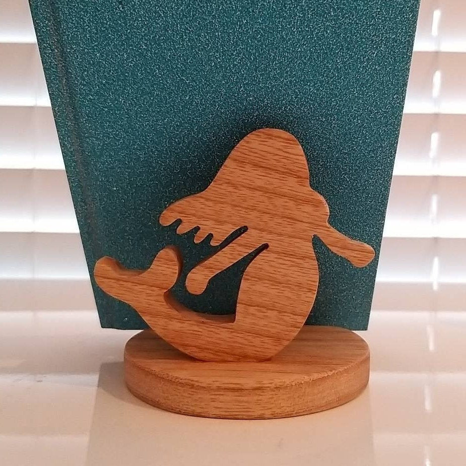 Wooden Phone Holder Mermaid on a desk