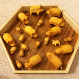 Hand carved little wooden pig. Natural yellow wood